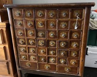 Chinese apothecary cabinet with divided drawers