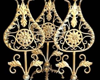 Three GoldToned Candle Stands 