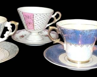 Four China CupSaucers 