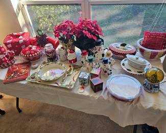 Christmas set on top left includes four dessert plates four coffee mugs a serving casserole dish with a lid and a carrying bag $50.00