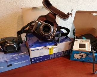 PO162Olympus, Canon, And Minolta Cameras