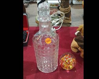 PAPER WEIGHT AND GLASS BOTTLE