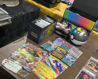 LOT OF POKMON CARDS AND OTHER POKMON ITEMS