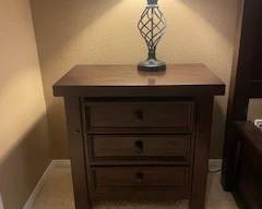 dark wood 3 drawer-night stand with lamp