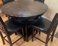 kitchen table with 4 matching chairs. In ok condition.