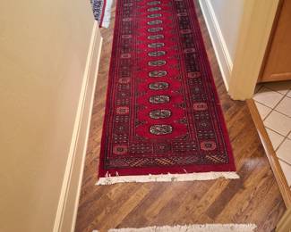 Woven hall rugs.