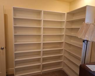 White bookshelves. Sold separately.