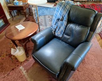 Leather recliner. Wood end table.