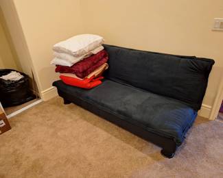 Futon. Bedding.