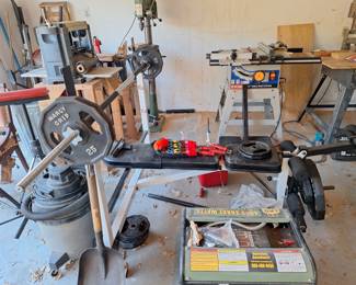 Weight bench w/free weights. Wood working equipment.