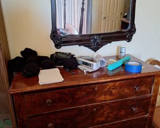 Antique dresser and mirror.