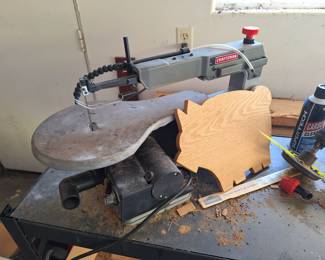 Craftsman saw. Cute pig.