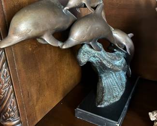 Bronze dolphin sculpture