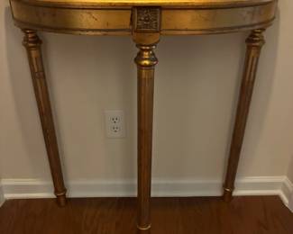 Gold demi lune table