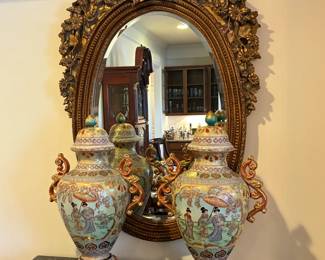 Oversize matching ginger jars and Louis XV style giltwood mirror