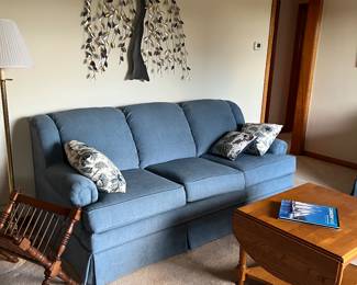 Sofa and wall hanging 