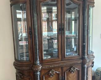China cabinet with curved glass doors