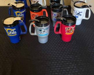 Collection of Travel Mugs from Various Sports Teams