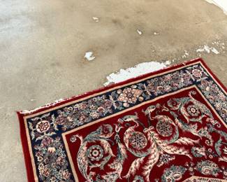 This lot features a Persian style rug that measures, 94” H x 63” W. 

