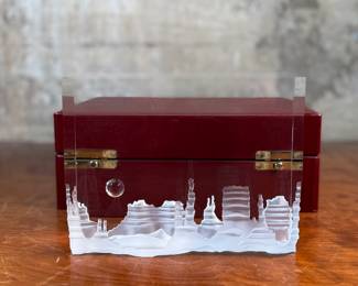 “Monument Valley”, an incredible crystal sculpture designed by Bernard X. Wolff for Steuben circa 1984. Comes in a stunning red presentation case, along with papers and documentation. This sculpture measures, 6.5” H x 8.75” W. 
