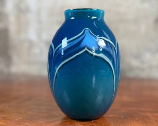 This lot features a stunning vase by Haberman Art Glass, signed underneath as shown in photos, circa 1985. This vase measures, 7” H x 4.5” W x 4.5” D.
