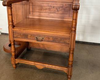 A stunning antique hall tree with solid brass hardware, a single dove tailed drawer below the bench, and an umbrella holder. This piece is in very good condition for its age and measures, 85” H x 36” W x 21” D.
