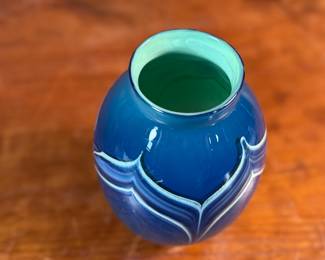 This lot features a stunning vase by Haberman Art Glass, signed underneath as shown in photos, circa 1985. This vase measures, 7” H x 4.5” W x 4.5” D.
