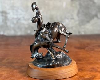 “Weaver”, a bronze sculpture after listed artist C.M. Russell. Signed as shown in photos and measures, 8” H x 6” W x 5” D. Charles Marion Russell, also known as C. M. Russell, Charlie Russell, and “Kid” Russell, was an American artist of the American Old West. He created more than 2,000 paintings of cowboys, Native Americans, and landscapes set in the western United States and in Alberta, Canada, in addition to bronze sculptures.
