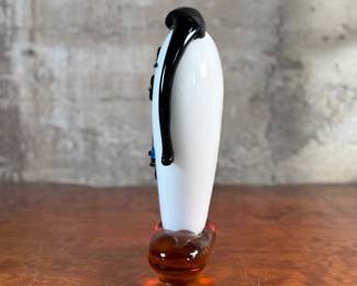 This lot features an Italian Murano glass face sculpture, circa 1970s. This sculpture is in good overall condition and measures, 14” H x 7” W x 3.5” D.
