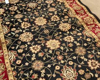 This lot features a modern Turkish style rug that measures, 89” H X 63” W.
