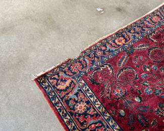 This lot features an antique handwoven Sarouk rug that measures, 78” x 62”.
