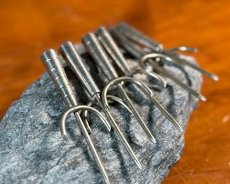 This lot features a set of six (6) antique sterling silver corn spikes with a total approx. weight of 19.46 grams.
