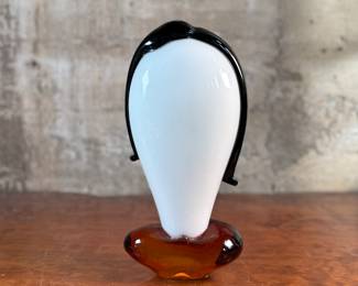This lot features an Italian Murano glass face sculpture, circa 1970s. This sculpture is in good overall condition and measures, 14” H x 7” W x 3.5” D.
