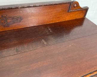 This lot features an antique Quarter-Sawn Oak sideboard with two dove tailed drawers and two cabinets with shelving. Minor wear throughout, but in good overall condition and measures, 42.5” H x 47.5” W x 17.25” D.
