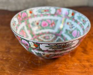 This lot features an antique Chinese rose medallion bowl in excellent condition that measures, 5.5” H x 12” W x 12” D. Marked underneath, "Overjoy" which is generally associated with porcelain that was hand-painted in Hong Kong.
