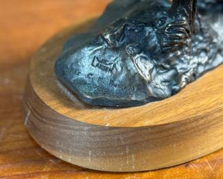 “Weaver”, a bronze sculpture after listed artist C.M. Russell. Signed as shown in photos and measures, 8” H x 6” W x 5” D. Charles Marion Russell, also known as C. M. Russell, Charlie Russell, and “Kid” Russell, was an American artist of the American Old West. He created more than 2,000 paintings of cowboys, Native Americans, and landscapes set in the western United States and in Alberta, Canada, in addition to bronze sculptures.
