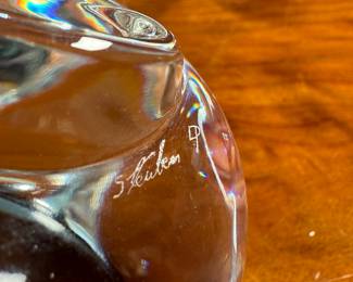"Octopus Hand Cooler", a Steuben glass octopus sculpture with a box to accompany this cutie!The Steuben Glass Works company, founded by Frederick Carder in 1903, was a prominent American glass company. The octopus sculpture was designed by Taf Lebel Schaefer and was introduced in 2005.
