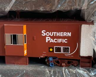 This lot features an Overland Models O Scale Brass SP ‘C50-9’ B-W Caboose. Built in Korea by Ajin Precision Mfg. Comes in original packaging.
