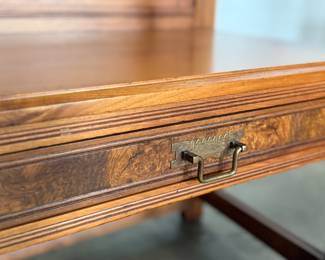 A stunning antique hall tree with solid brass hardware, a single dove tailed drawer below the bench, and an umbrella holder. This piece is in very good condition for its age and measures, 85” H x 36” W x 21” D.
