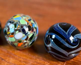 This lot features a collection of three (3) paperweights, all signed by Haberman Art Glass.
