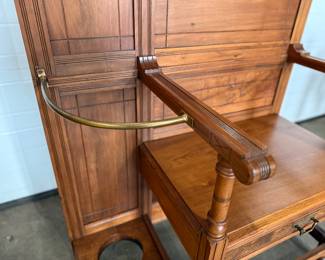 A stunning antique hall tree with solid brass hardware, a single dove tailed drawer below the bench, and an umbrella holder. This piece is in very good condition for its age and measures, 85” H x 36” W x 21” D.
