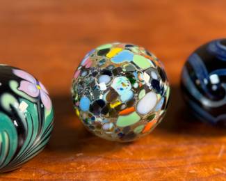 This lot features a collection of three (3) paperweights, all signed by Haberman Art Glass.
