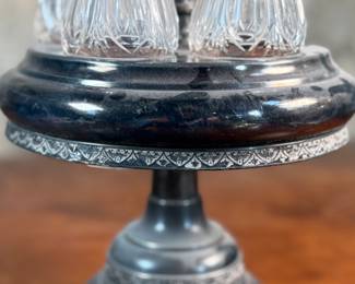 This lot features an antique cruet that appears to be made in the 19th century with five (5) misc. bottles, all of which appear to be cut crystal glass. This cruet measures, 18” H x 8” W x 8” D.
