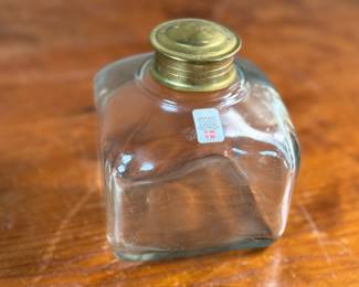 This lot features a vintage glass storage jar, manufactured by Danish company, Holmegaard. In good overall condition with maker sticker present as shown in photos. Holmegaard is a historic Danish glassworks, founded in 1825 by Countess Henriette Danneskiold-Samsøe, that is known for its artistic and functional design. The brand, now owned by the Rosendahl Design Group, continues a tradition of Danish glassmaking that has included prominent designers like Jacob E. Bang, Per Lütken, and Jette Frölich. Today, Holmegaard continues to produce designs rooted in Scandinavian modernism and craftsmanship.
