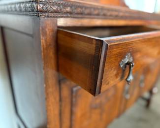 This lot features an antique Quarter-Sawn Oak sideboard with two dove tailed drawers and two cabinets with shelving. Minor wear throughout, but in good overall condition and measures, 42.5” H x 47.5” W x 17.25” D.
