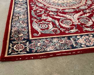 This lot features a Persian style rug that measures, 94” H x 63” W. 
