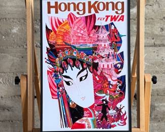 "Hong Kong Fly TWA", a reproduction framed print of David Klein’s famous artwork in the 1960s for Trans World Airlines. This piece measures in frame, 23.5” H x 15.75” W.
