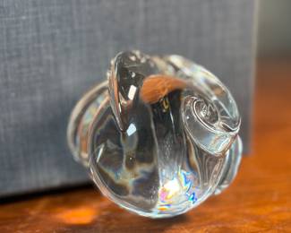 "Octopus Hand Cooler", a Steuben glass octopus sculpture with a box to accompany this cutie!The Steuben Glass Works company, founded by Frederick Carder in 1903, was a prominent American glass company. The octopus sculpture was designed by Taf Lebel Schaefer and was introduced in 2005.
