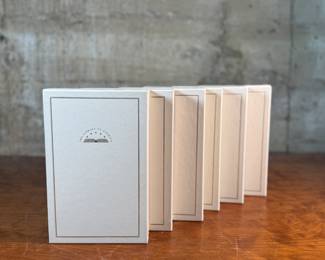 This lot features a collection of six (6) hardcover books with slipcases from the Library of America series. The Library of America is a nonprofit publisher that creates authoritative editions of classic American literature and historical documents. The books in the image include "Debate on the Constitution, " "Franklin: Writings, " "Jefferson: Writings, " "Washington: Writings, " and "Lincoln: Speeches and Writings".
