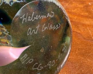 This lot features a collection of three (3) paperweights, all signed by Haberman Art Glass.
